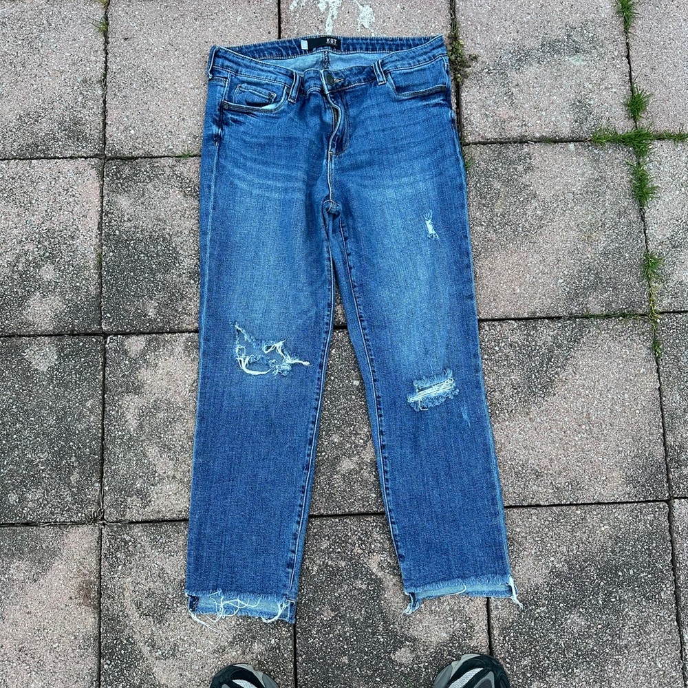 Distressed Blue Jeans